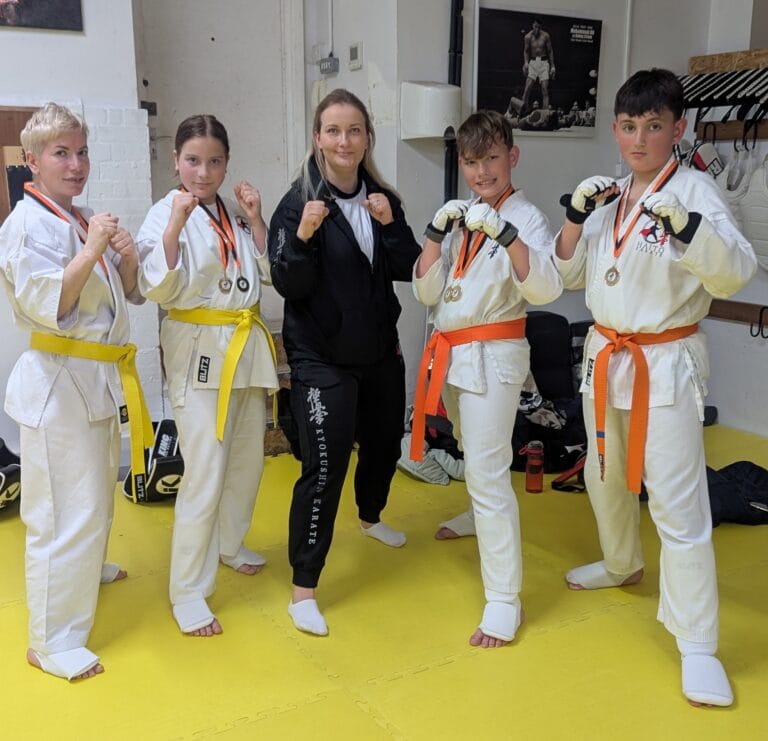 True Karatekas Celebrate on the Mat! 🥋